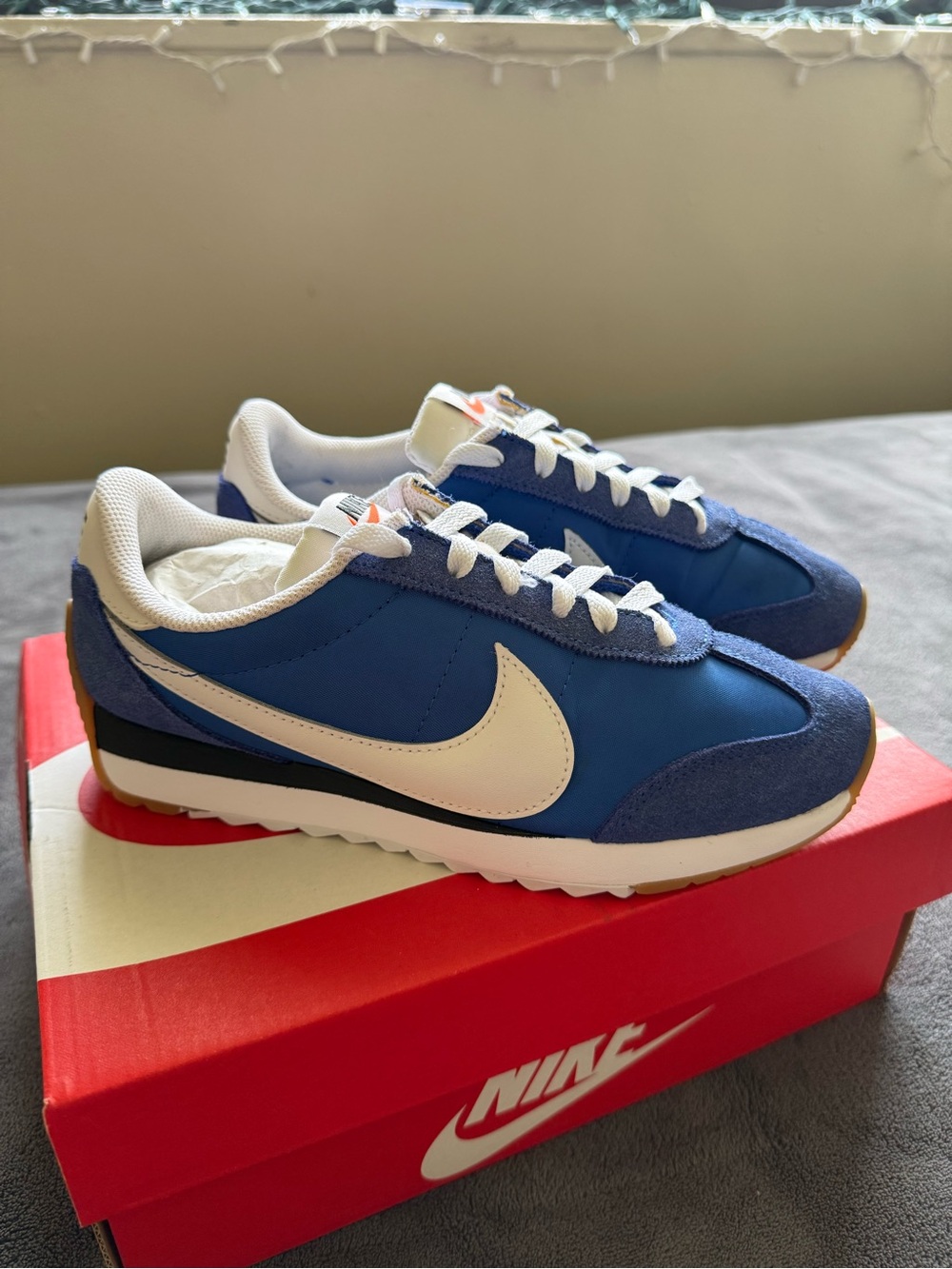Nike Men's Blue Retro Runner with White Swoosh and Gum Outsole